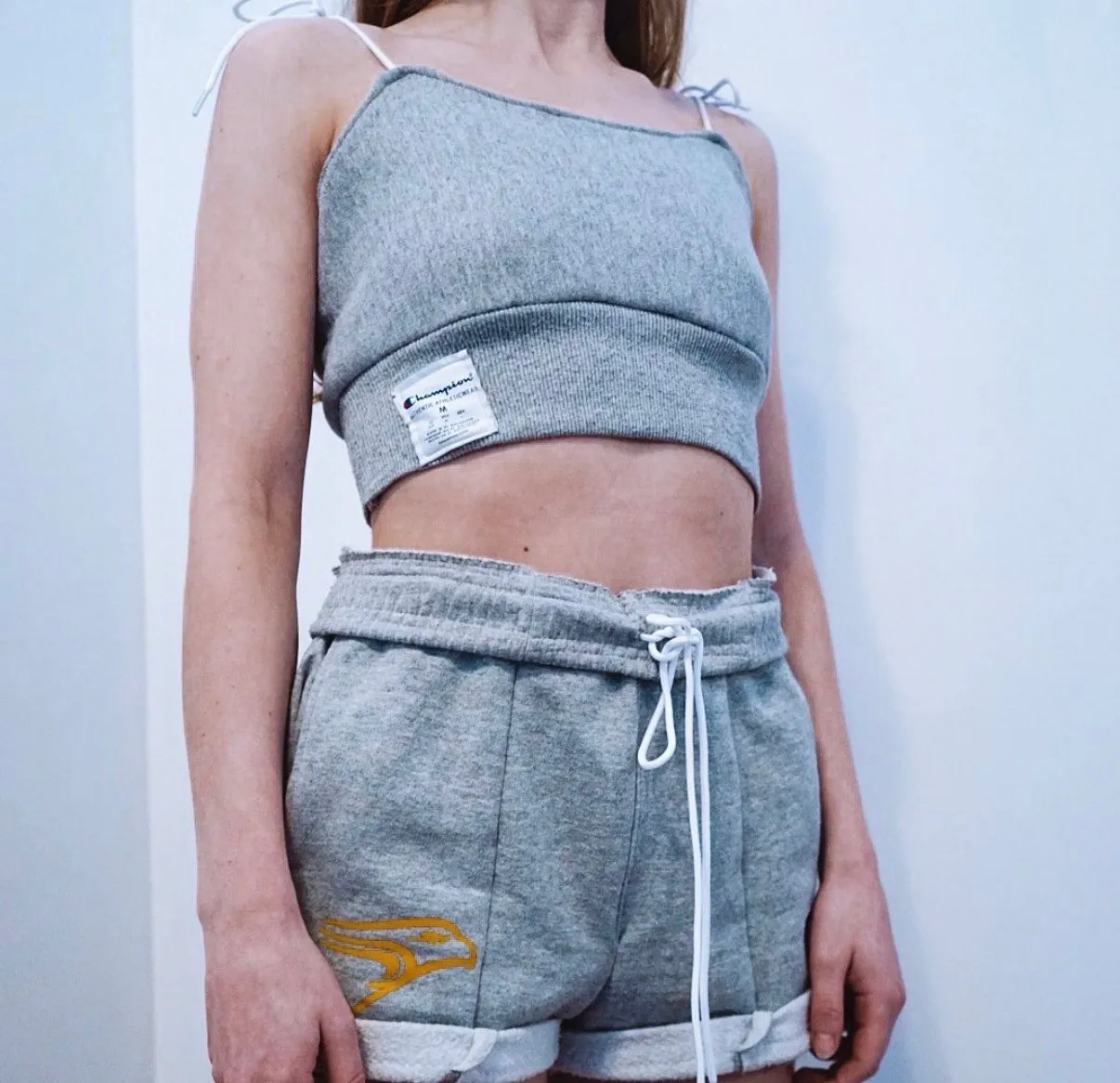 Eryn wearing the grey crop top and shorts set