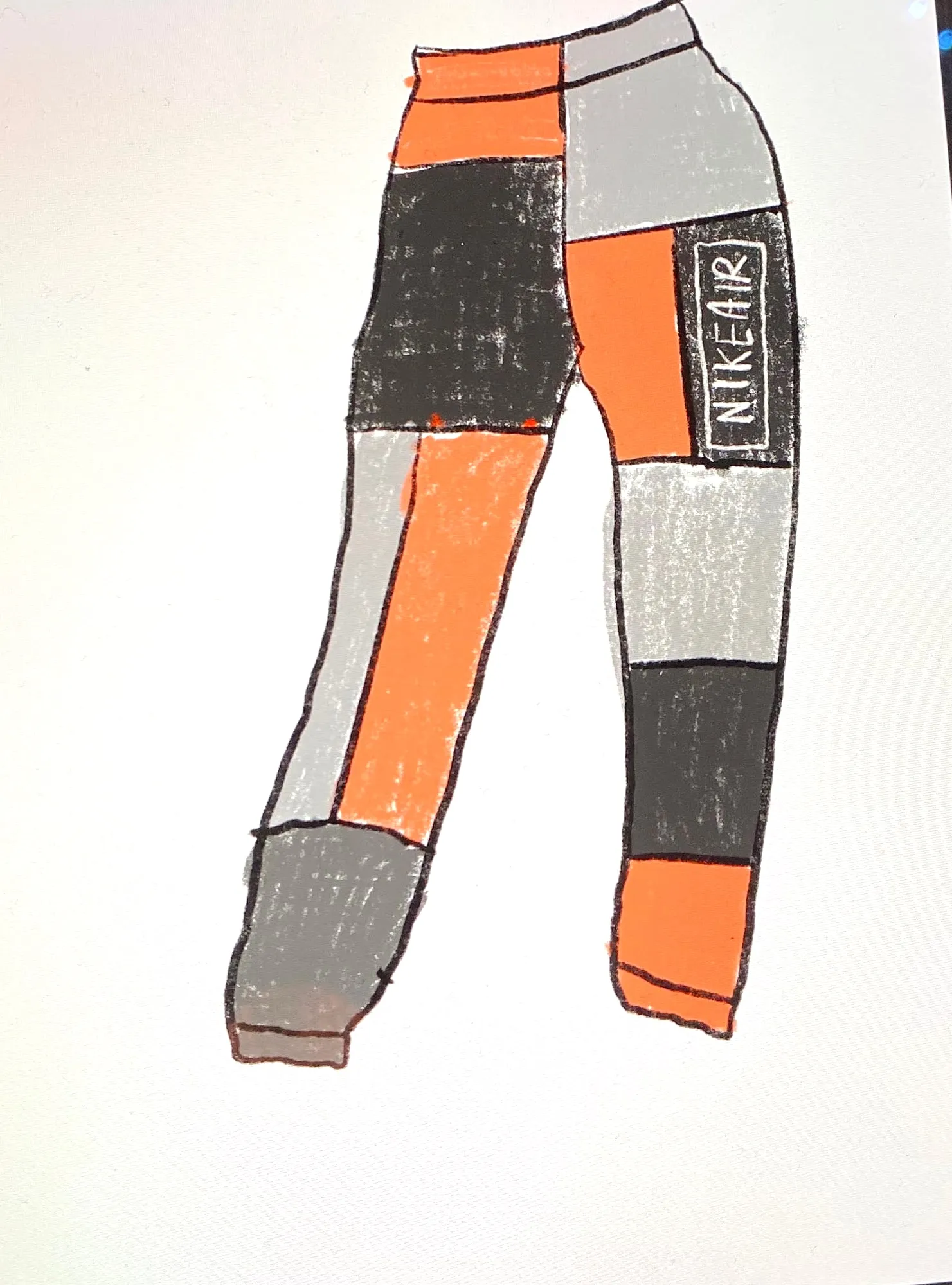 A coloured drawing of the planned joggers, with orange, grey and black panels and the Nike Air logo on one leg